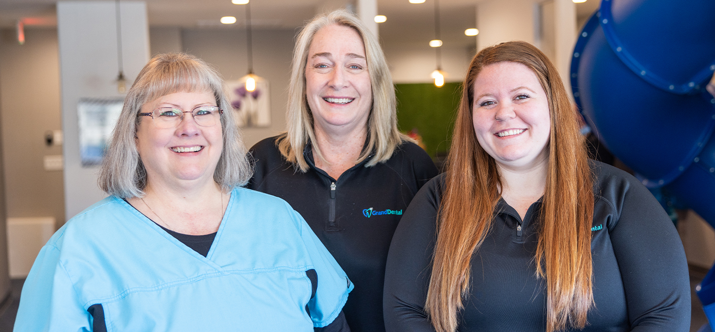 Three dental team members