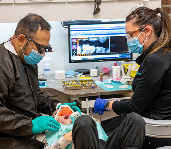 Patient receiving fluoride treatment