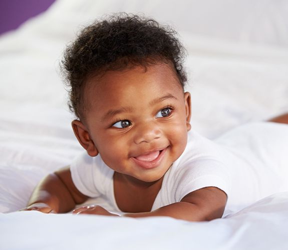 Baby laughing after lip and tongue tie treatment