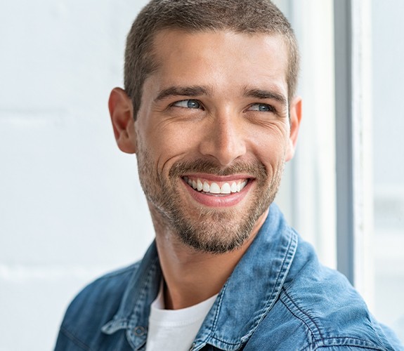 Man with flawless smile after gum recontouring