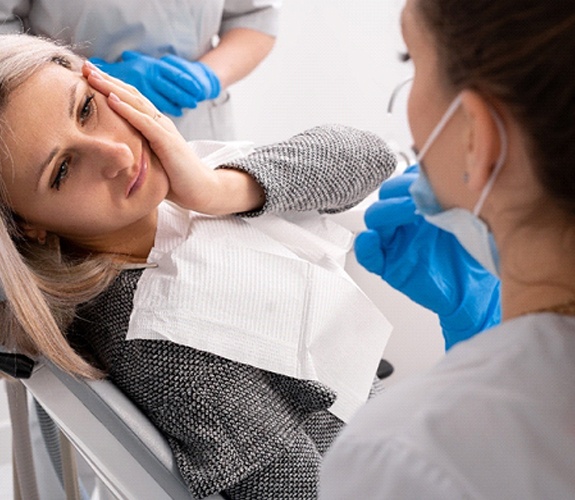 Patient listening to emergency dentist in Sycamore