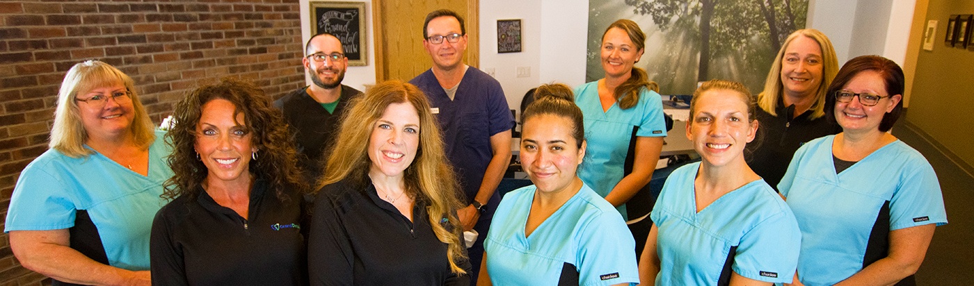 The Sycamore dentists and dental office team
