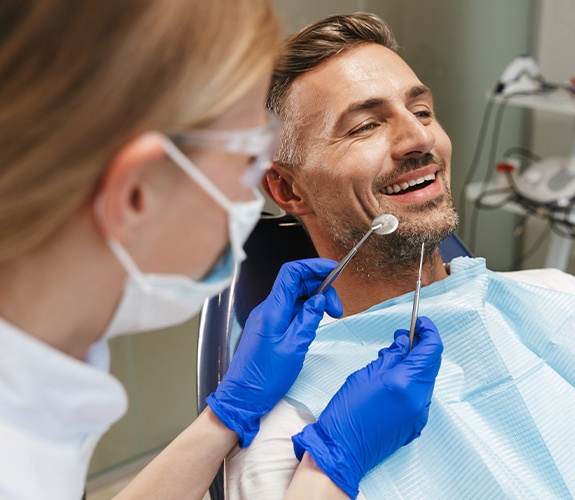 Man receiving dental treatment