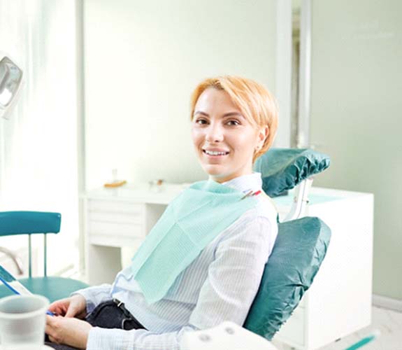 Female dental patient visiting dentist for Invisalign in Sycamore, IL