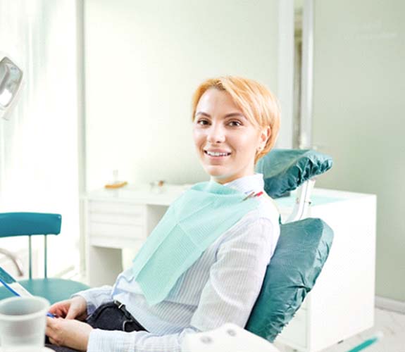 Female dental patient visiting dentist for Clear Aligners in Sycamore, IL