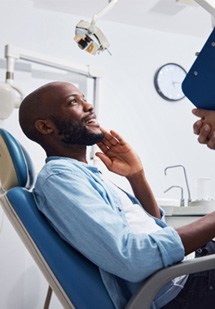Man smiling at the dentist