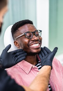 Man smiling at the dentist
