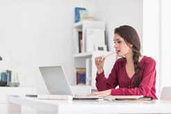 Woman chewing on pencil in Sycamore 