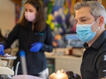 team member working on patient