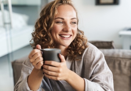 Woman with gorgeous smile after cosmetic dentistry