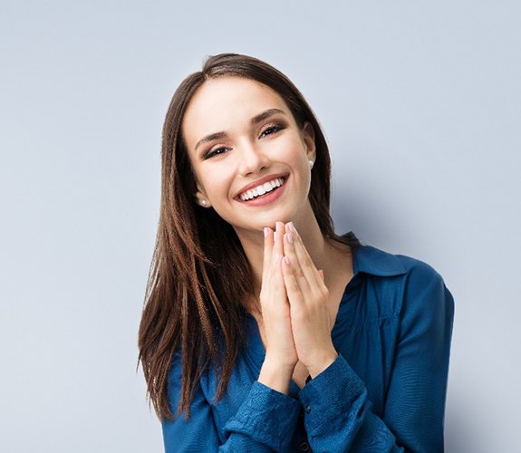 Woman pleased with her whiter smile