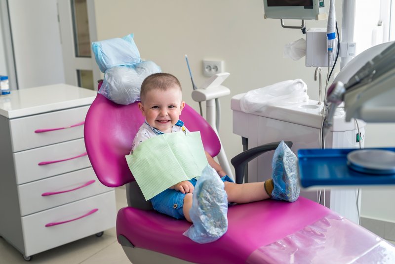 Little boy sitting in a dental chair